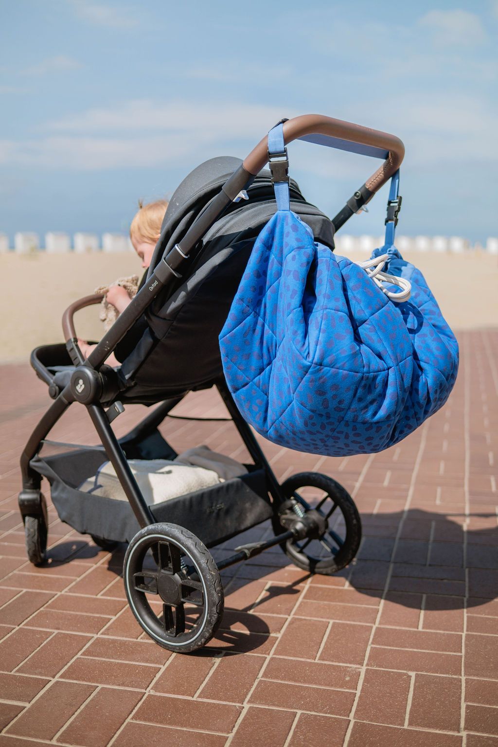 soft Puce&Pilou by Moulin Roty, the bag is fixed to the buggy
