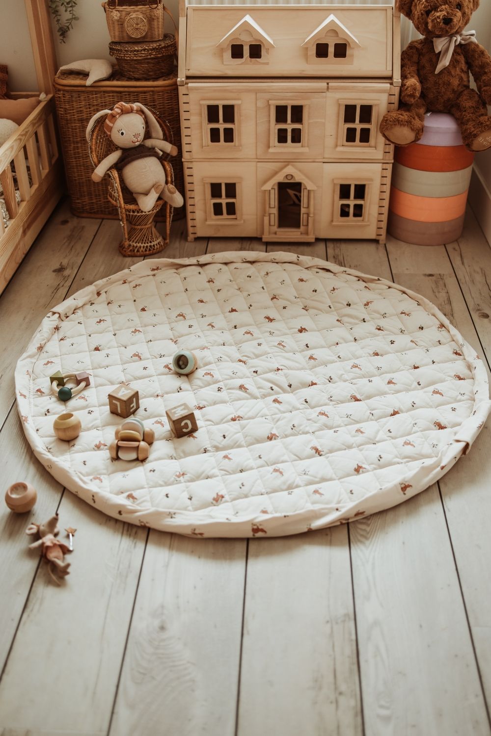 rabbit soft organic babymat, open on floor in kidsroom, victorian playhouse, cuddles and toys