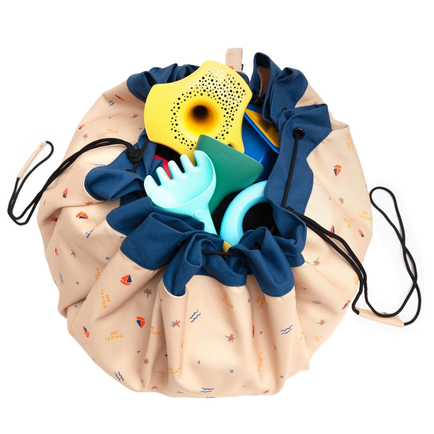 detail of magical days outdoor beach bag, filled with toys