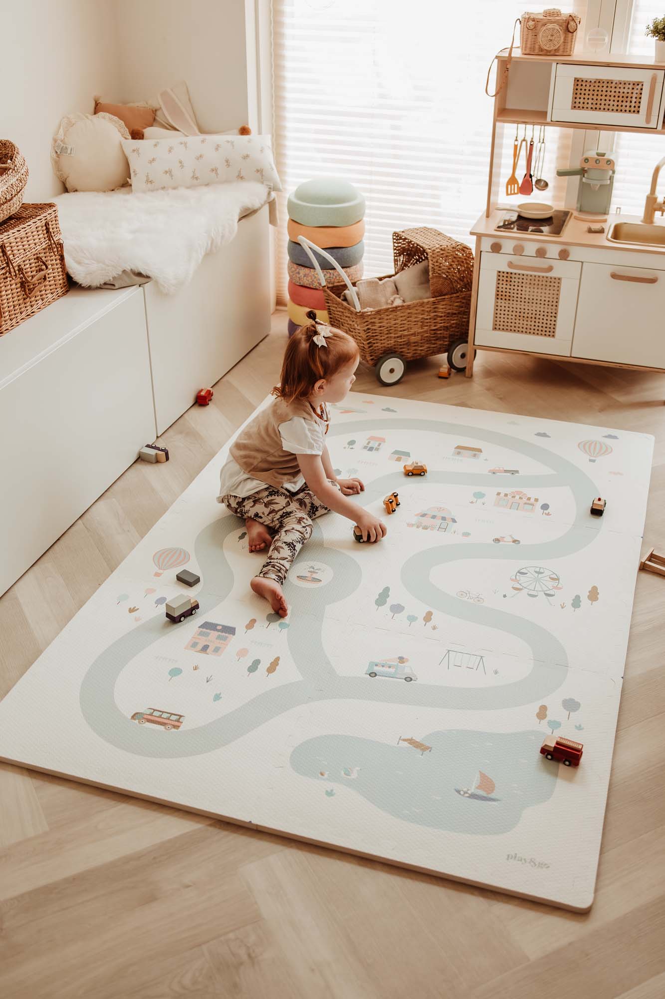 EEVAA village/terrazzo foam puzzle mat, child playing on mat on floor in kidsroom