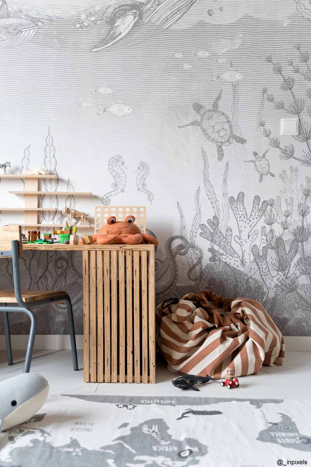 Stripes Brown toy storage bag and play mat, bag on floor in kidsroom next to wooden desk