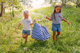 Pirate outdoor storage bag, children are holding the bag on its shoulderstrap, frontside