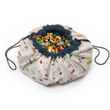 funny days toy storage bag and playmat, closed bag filled with lego