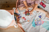 soo fairyworld, open basket with playmat, child is sitting on the mat while playing