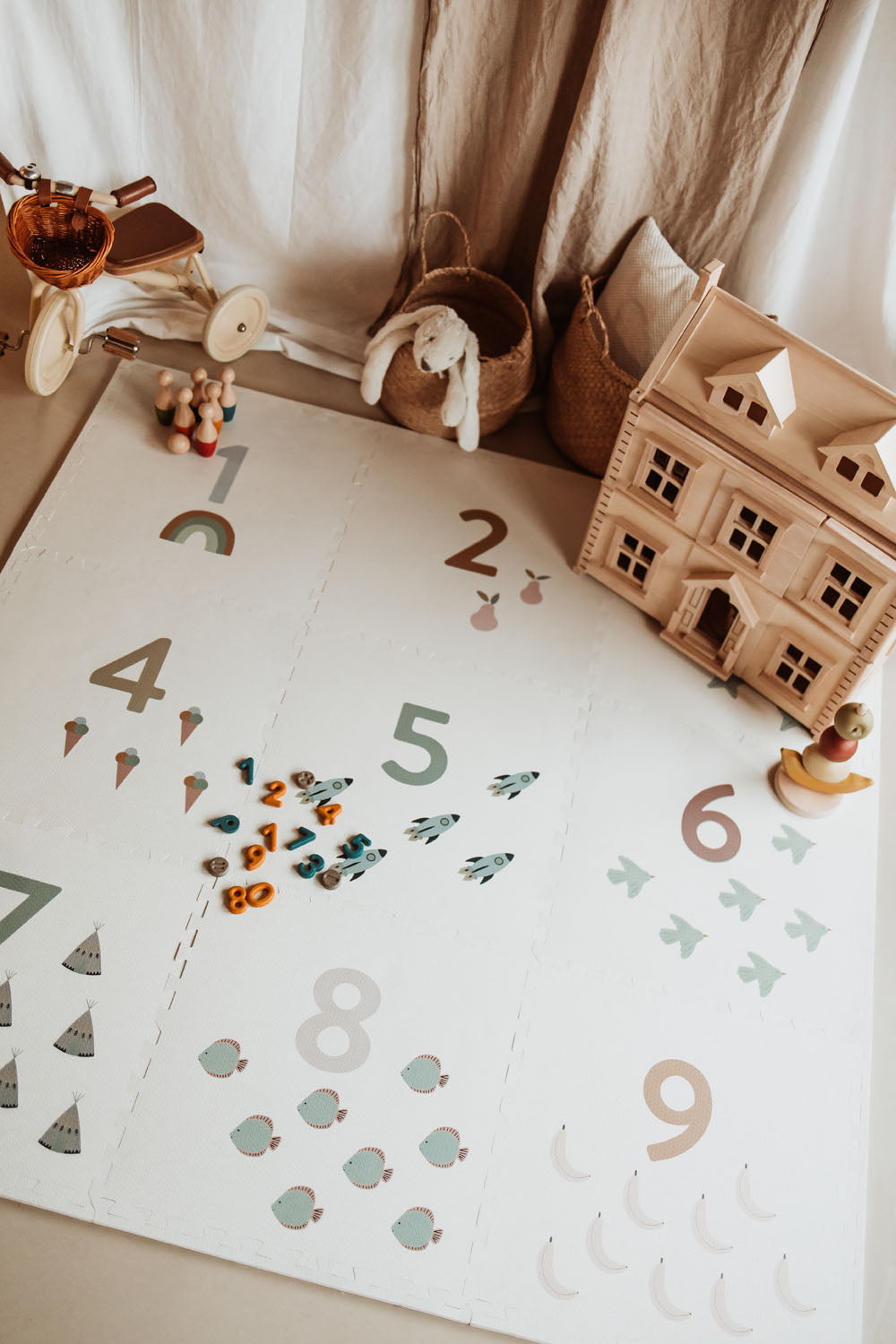 numbers puzzlemat, lots of wooden toys, tricycle and victorian play house