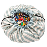 product picture toy storage bag and play mat, green stripes, filled with lego